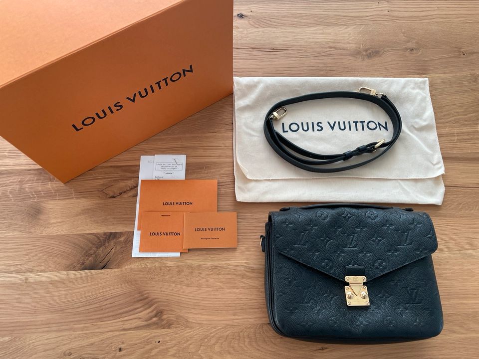 Louis Vuitton Pochette Métis schwarz Monogram Empreinte Leder in  Baden-Württemberg - Korntal-Münchingen