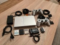 PlayStation 2 slim Silber + Spiele + 2 Controller Mecklenburg-Strelitz - Landkreis - Neustrelitz Vorschau