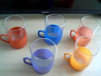 Vintage 5 Teegläser DDR mit bunter Halterung für Glaseinsatz Sachsen - Stauchitz Vorschau