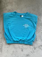 H & M Shirt Gr.XXS  blau kurzarm crop Schulterpolster Bayern - Zandt Vorschau