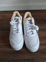 Adidas  Sneaker  weiß  gelb   41 Neu Nordrhein-Westfalen - Elsdorf Vorschau