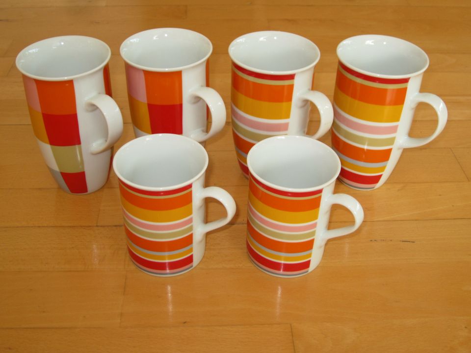 6 Kaffeetassen (gelb, orange, rot) in Aachen