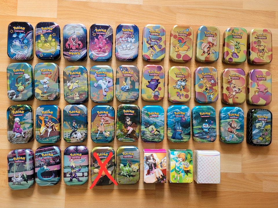 50 Pokemon Karten boosterfrisch + 1 Mini Tin oder Deck Box in Berlin