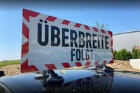 KFZ Dachträgersystem "Überbreite folgt" - Warnschild für Agrar Bayern - Neufahrn in Niederbayern Vorschau