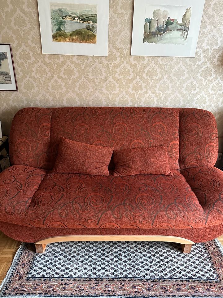 Rotes Aufklappbares sofa mit Bett mit Stauraum in Hamburg