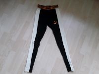 Puma Damen Leggings XS/34 mit Bündchen schwarz/beige/gold Niedersachsen - Himmelpforten Vorschau