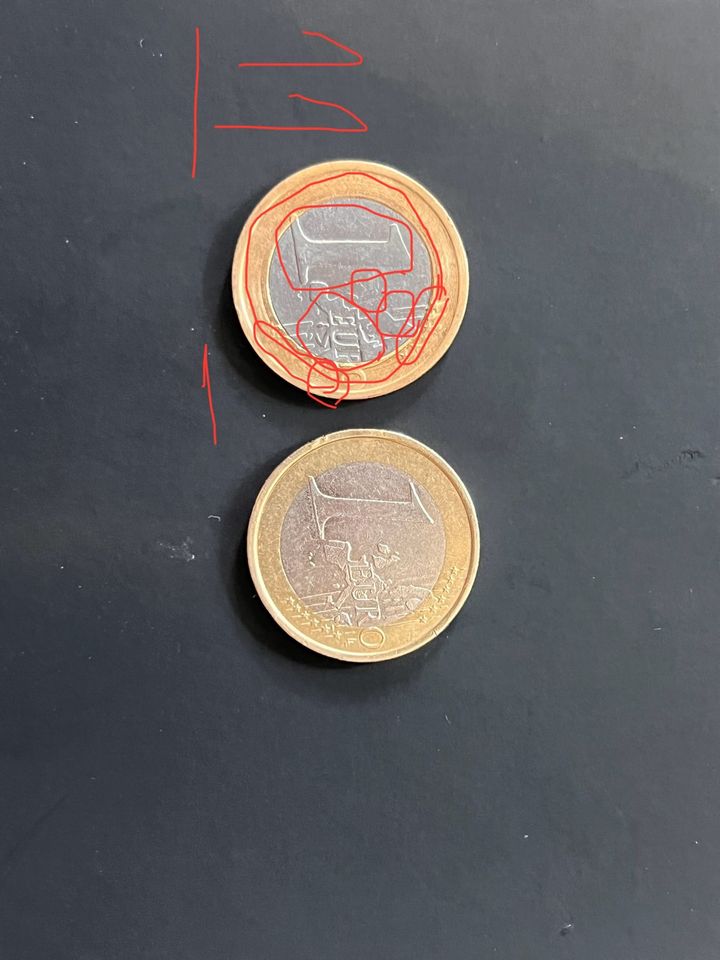 Ein Euro münze mit viel gedruckt Fehler in Leipzig