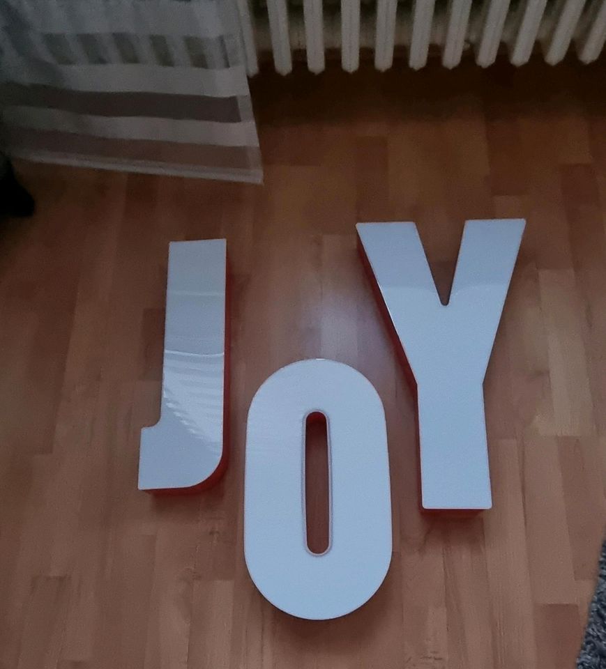 Schild JOY in Köln