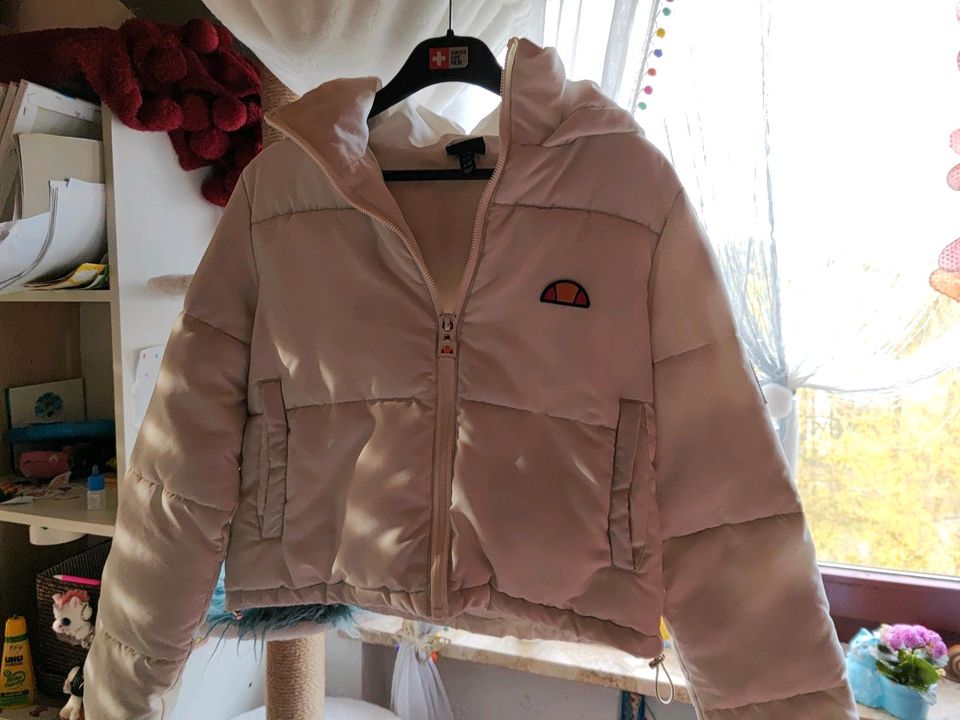 Wattierte ellesse Jacke gr 38 in Passau