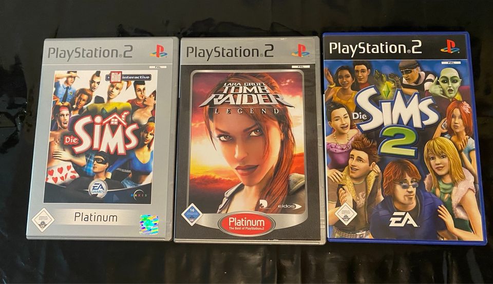 PS2 Spiele 3 Stück Sims Platinum , Sims 2 , Tomb Raider Legend in Löhne