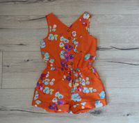 Next Jumper Jumpsuit Overall kurz orange Blümchen Gr. 110 Niedersachsen - Adendorf Vorschau