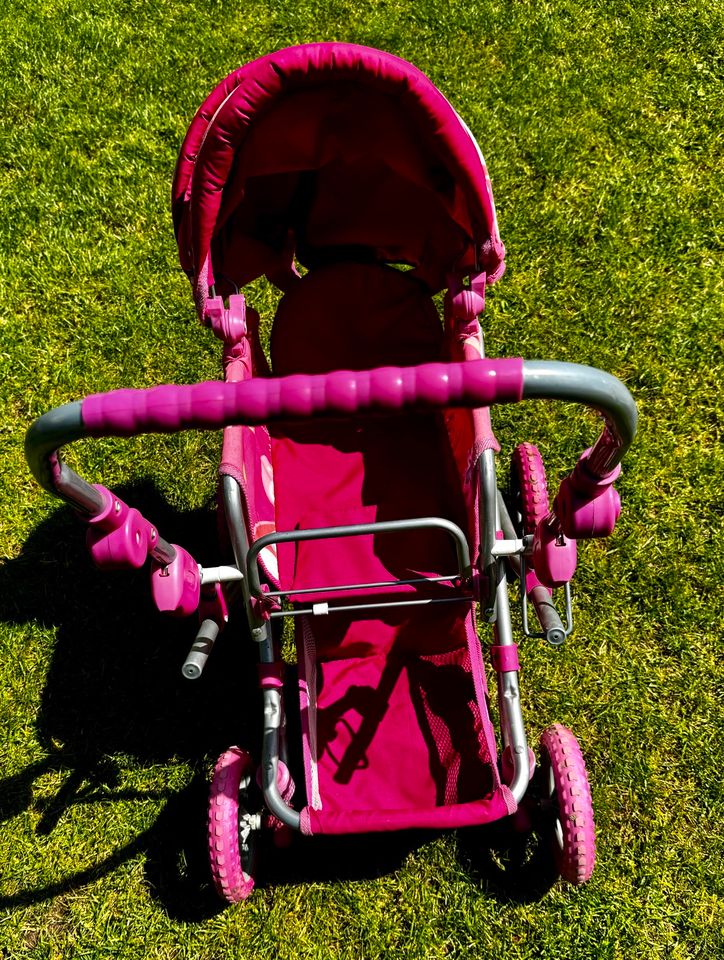 Puppenwagen gebraucht - rosa mit Geländereifen in Bad Homburg