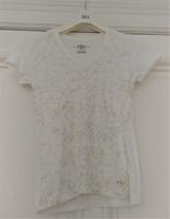 weißes T-Shirt in XS mit goldfarbenen Druck von Tommy Hilfiger Berlin - Friedenau Vorschau
