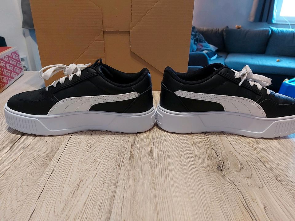 PUMA Damen Karmen Rebelle Sneaker  ￼  ￼  ￼  ￼  ￼  ￼  ￼ in Crinitzberg