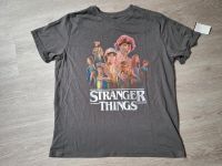 NEU T-Shirt STRANGER THINGS L NETFLIX Hessen - Fernwald Vorschau