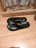 Puma  FlipFlops / Badeschuhe Gr. 34  schwarz/weiß Hessen - Schöffengrund Vorschau