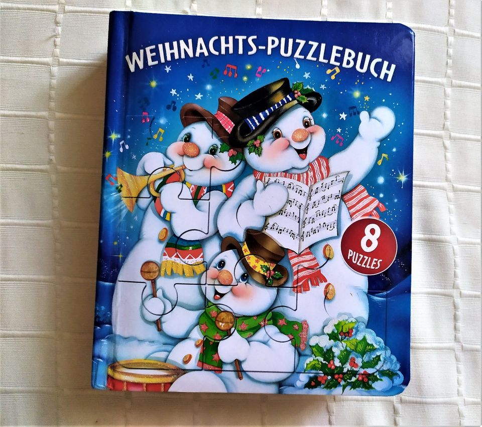 sehr gut erh. Weihnachtspuzzlebuch "Schneemann" mit 8 Puzzle in Dresden