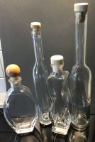 4 dekorative Glasflaschen mit Korken für Likör oder Kräuteröl Hessen - Eschenburg Vorschau