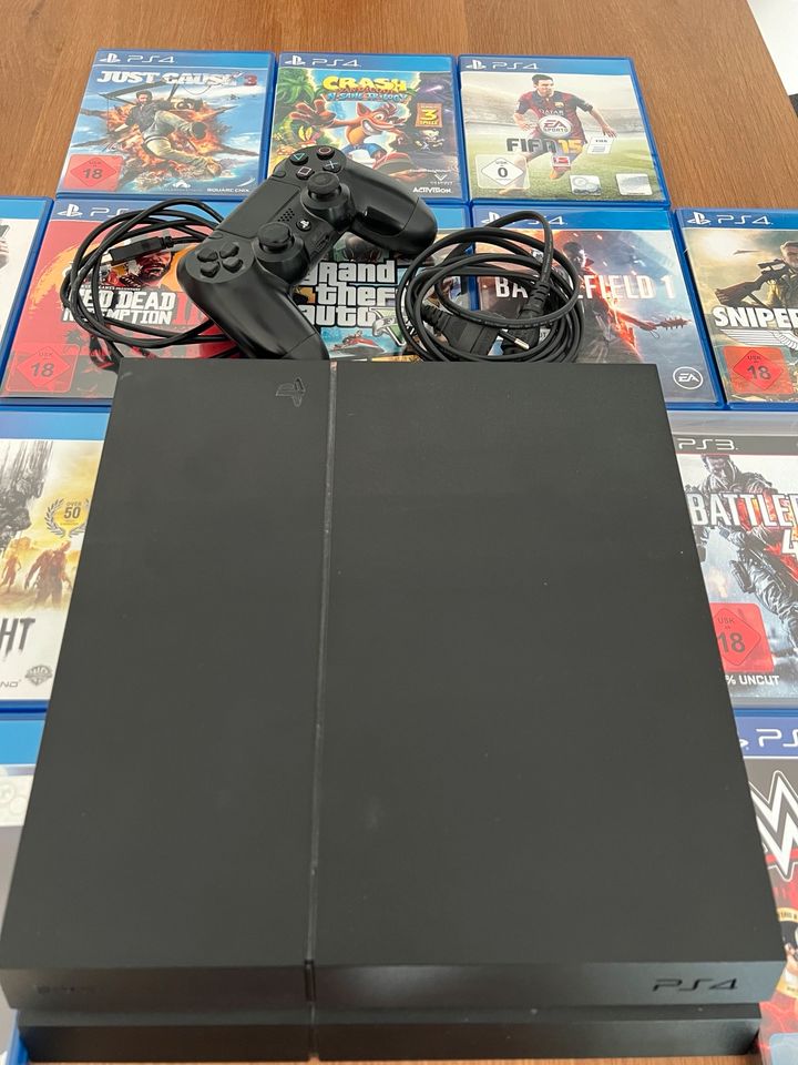 PS4 PlayStation 500GB + 13 Spiele in München