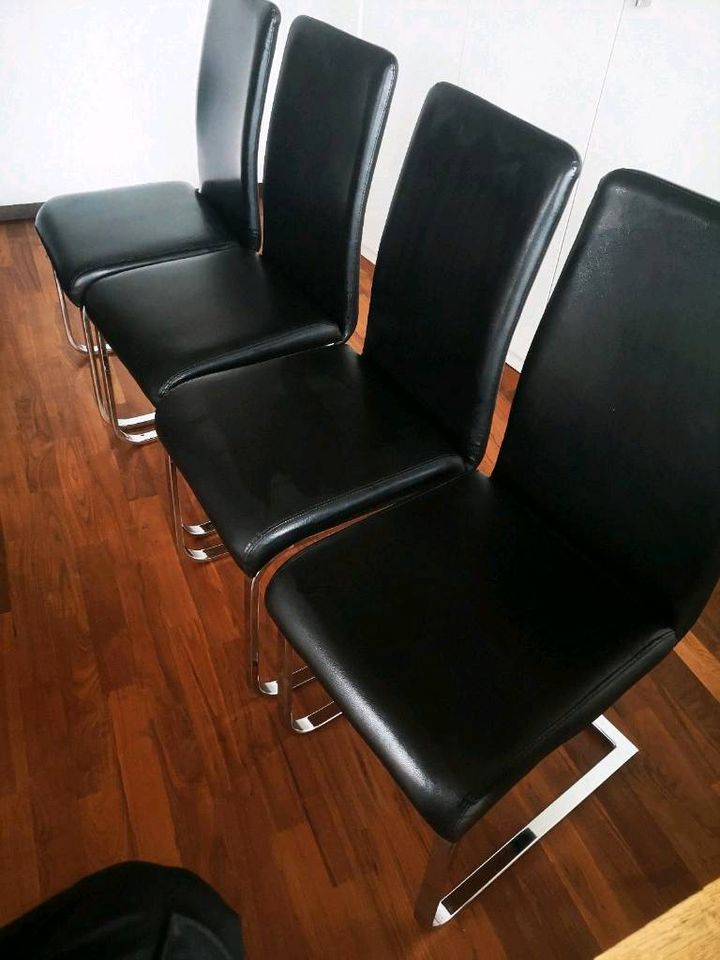 4x Esstisch Stühle schwarz Typ: Schwinger in Riegel