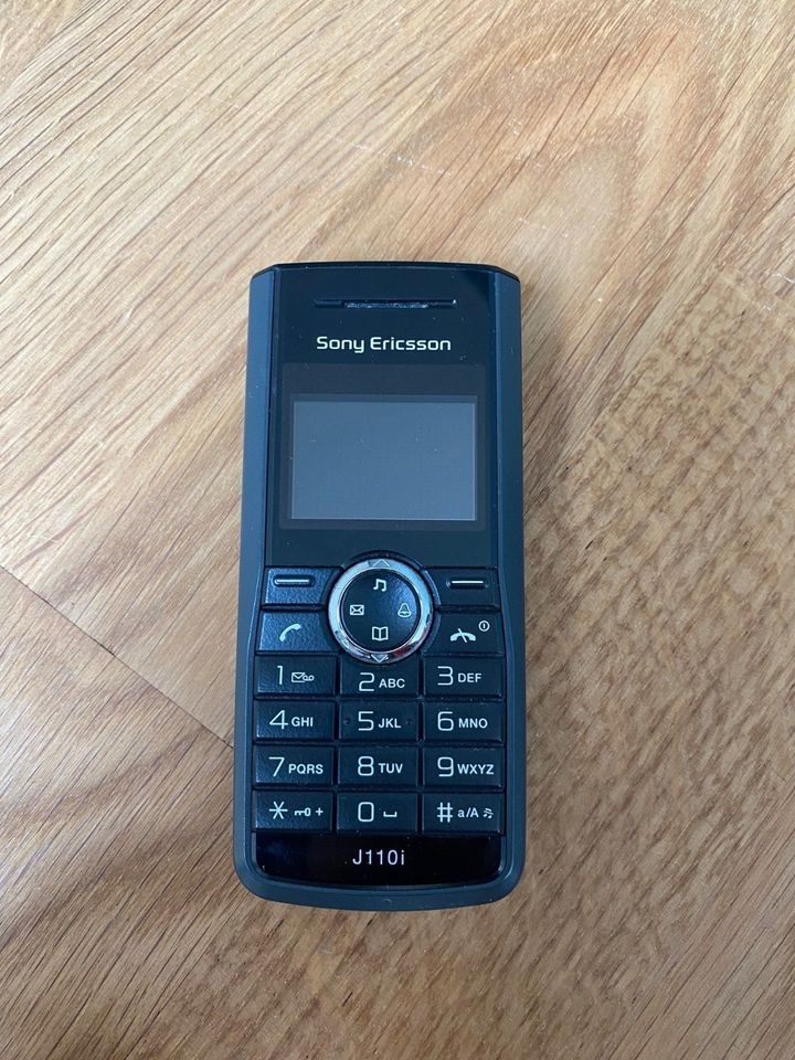 Handy Sony Ericsson J110i inkl. Ladekabel in Ismaning