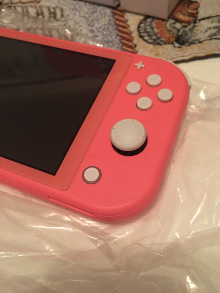 Nintendo switch lite Spielekonsole rosa wie neu top Zustand in Döbeln