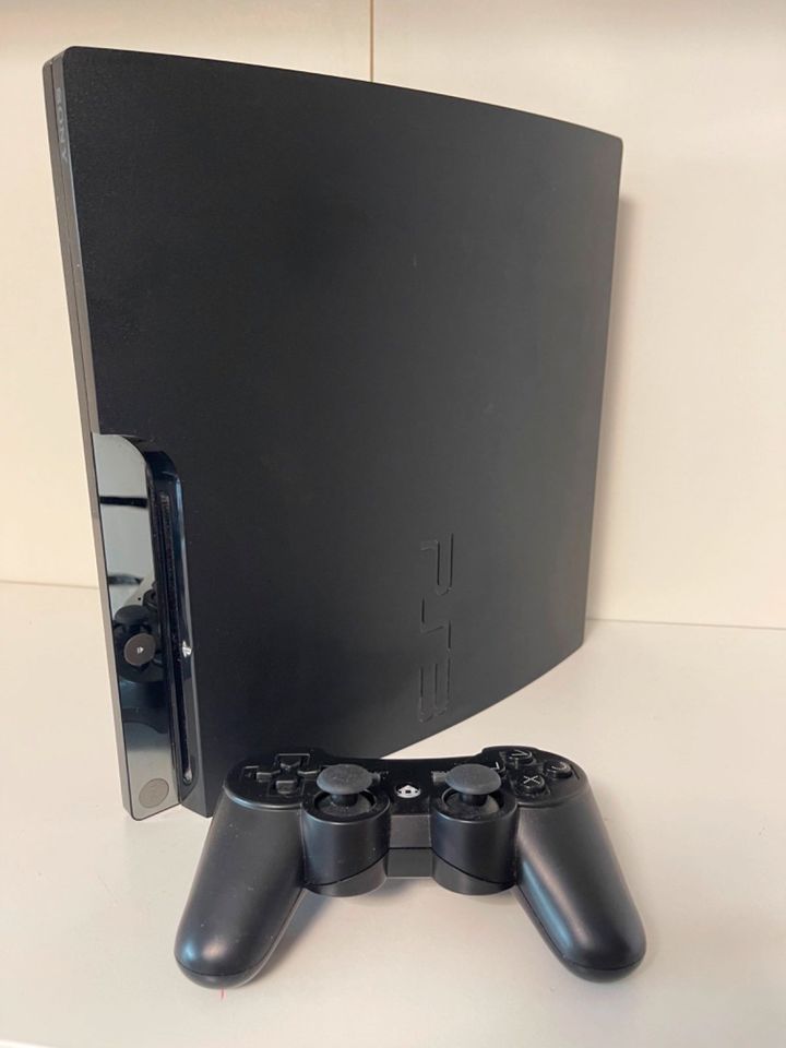 PlayStation 3 mit 2 Drückern und 2 Spielen in Appenweier