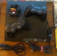 PlayStation 3 slim mit 2 Controllern und 9 Spielen Saarland - Blieskastel Vorschau
