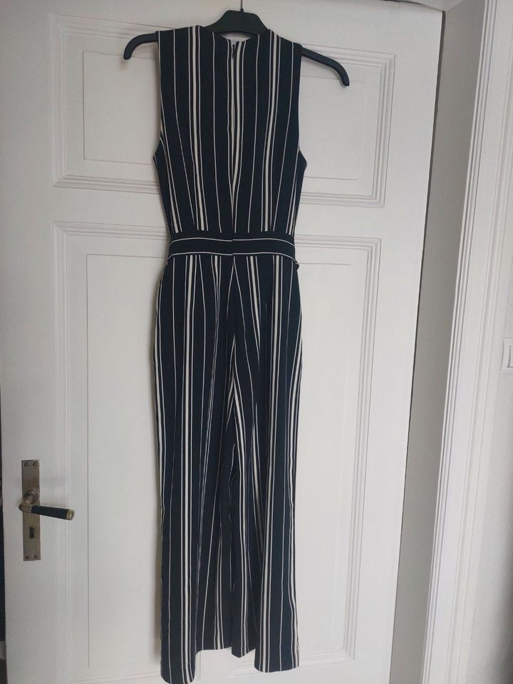 Jumpsuit business schwarz weiß gestreift weites Bein H&M Gr. 34 in Bad Oldesloe