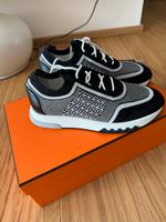 Hermes Sneaker Femme Addict in schwarz mit Silber metallic München - Schwabing-Freimann Vorschau