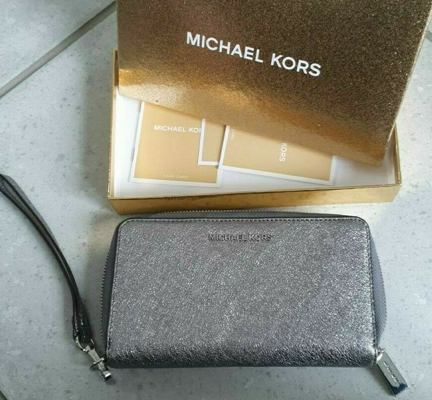 MK Michael Kors Portemonnaie Geldbörse Clutch silber Handyfach in  Niedersachsen - Wolfsburg | eBay Kleinanzeigen ist jetzt Kleinanzeigen