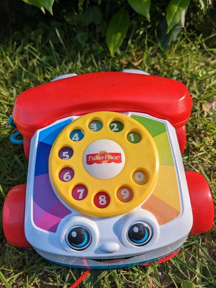 VTech lustige Fahrschule und Fisher Price Telefon in Urbach Westerw