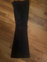 Gucci Hose Schwarz mit ausgestelltem Bein ital Gr. 42 Berlin - Wilmersdorf Vorschau