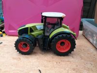 Bruder Traktor claas 950 axion Nordrhein-Westfalen - Hamminkeln Vorschau