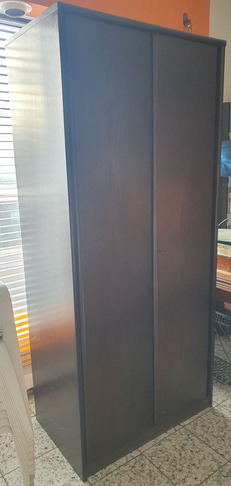 Holzkleiderschrank mit 2xTüren dunkelbraun zerlegbar in Bühl