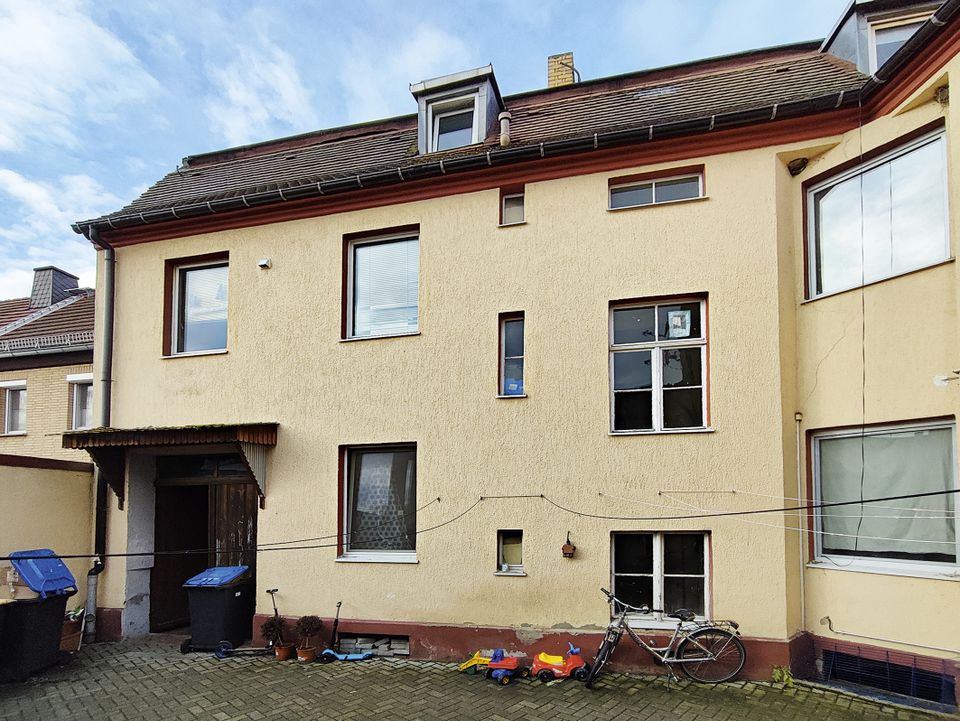 AUKTION: Mehrfamilienhaus mit Seitenflügel und Hinterhaus mit Garage in Mühlberg/Elbe