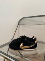 Nike Cortez schwarz/gold Düsseldorf - Düsseltal Vorschau
