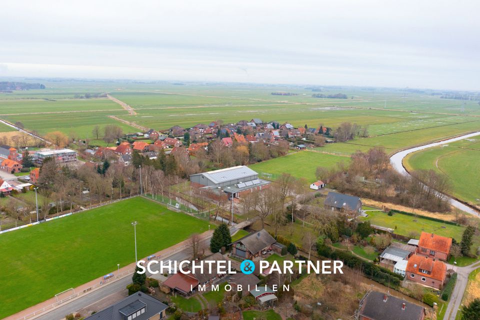 Stadland - Schwei | Großzügiges Einfamilienhaus mit Terrasse, großem Garten & weiterem Baugrundstück in Stadland