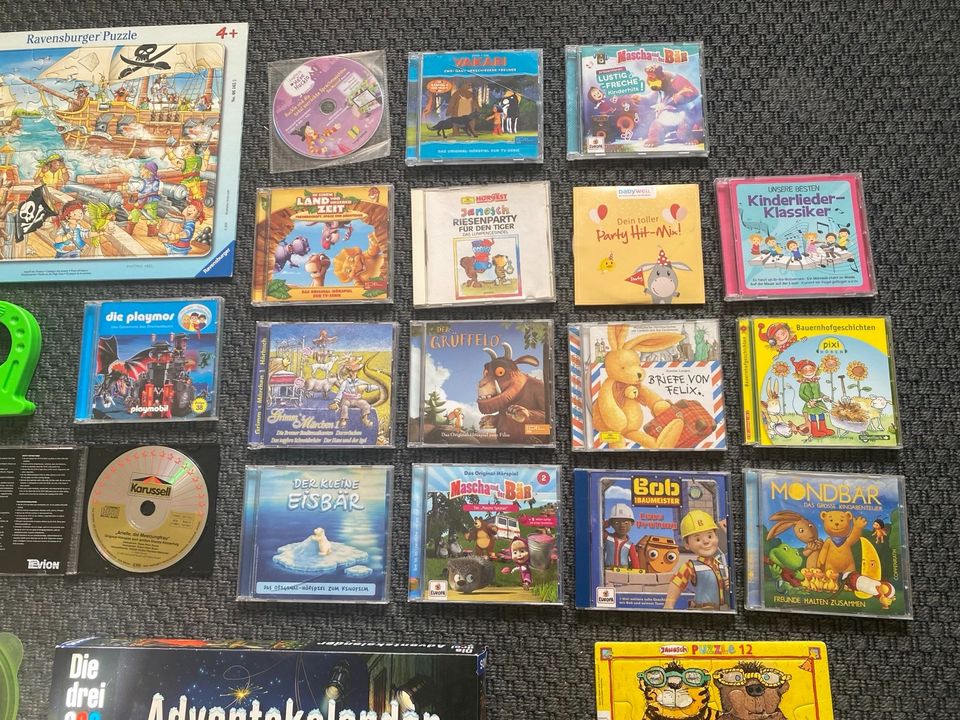 Spielzeug Paket Puzzle cds Magnet Pumuckl Grüffelo Bob arielle in Mechernich