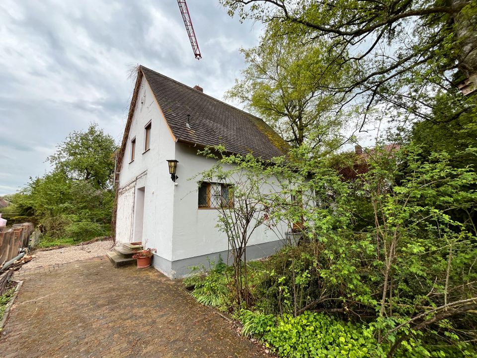 Einfamilienhaus mit großem Grundstück in beliebter Lage von Gröbenzell in Gröbenzell