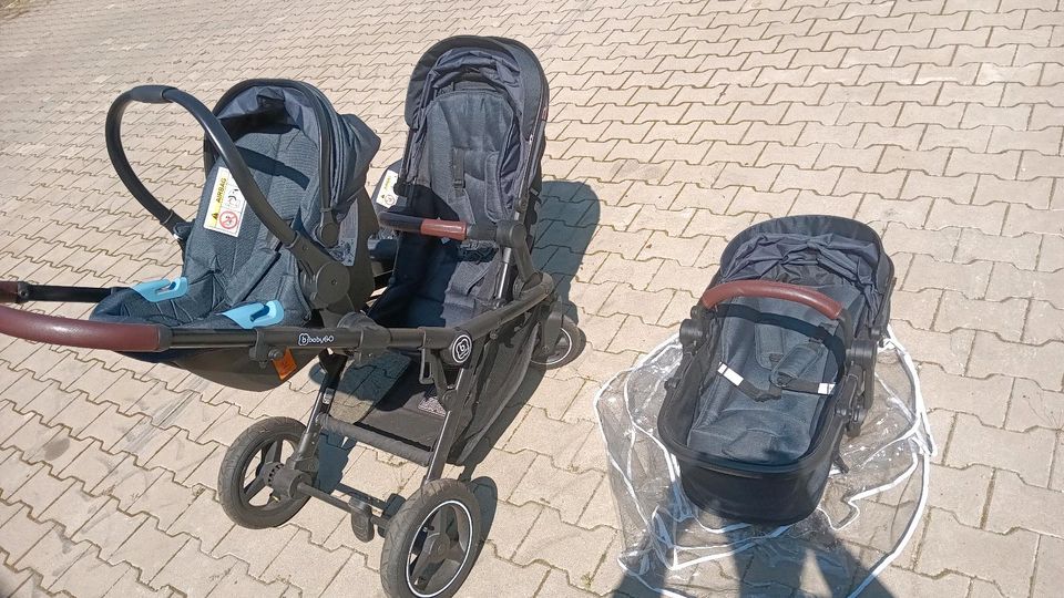 Zwillingskinderwagen Geschwisterwagen Babyschale Regenhaube in Mönchsroth