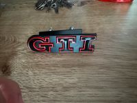 GTI Emblem rot schwarz neu Kühlergrill Hessen - Lollar Vorschau