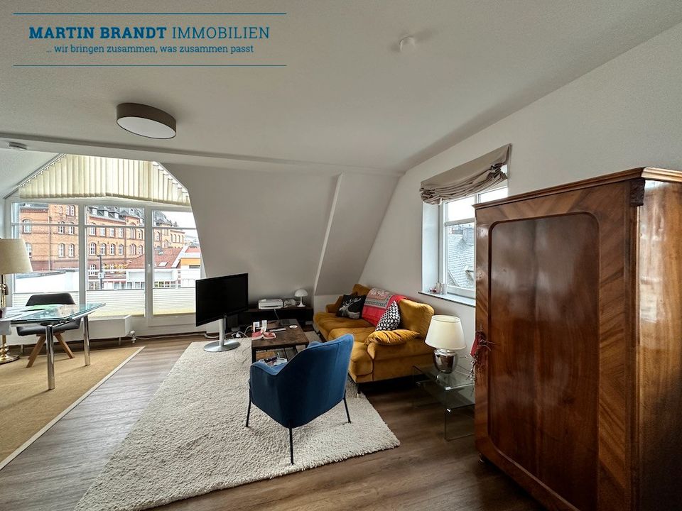 Sonnige 2 Zimmer Studio Wohnung mit Kamin und Balkon  mit Traumblick auf die Idsteiner Altstadt in Idstein