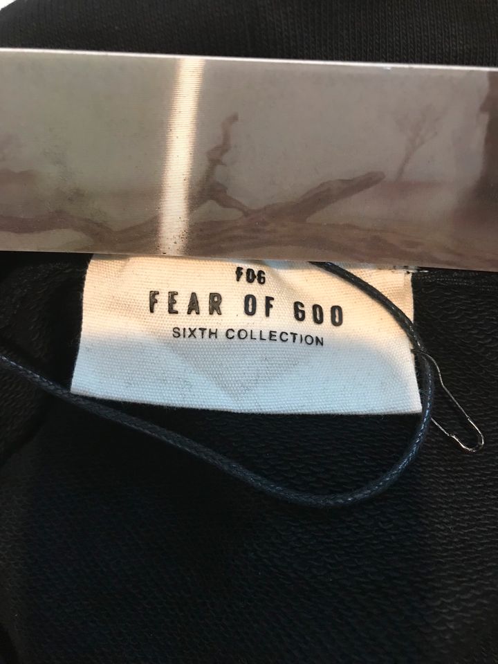 Fear of god essentials hoodie in Hamburg