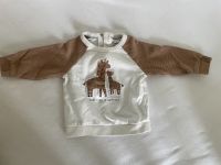 Baby Sweatshirt cremeweiß mit Giraffen von C&A Gr. 74 Nordrhein-Westfalen - Detmold Vorschau