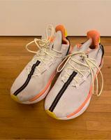 Puma Turnschuhe sneaker 40 weiß orange gelb top Zustand Köln - Bayenthal Vorschau