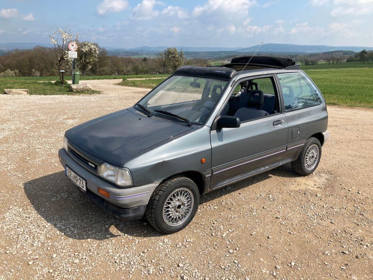 Abbildung des Autos Mazda 121 DA - Panoramad…