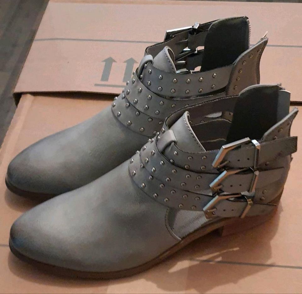 Stiefeletten Cuts Out 38 grau und schwarz in Niemetal