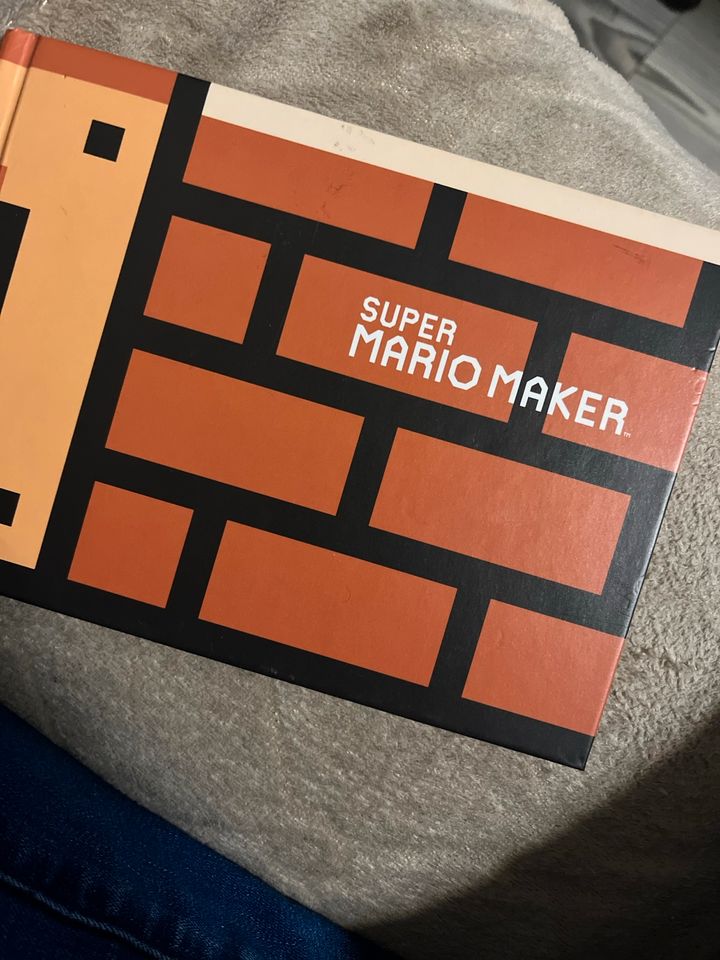 Wii U Spiele + Mario Maker Buch in Düsseldorf