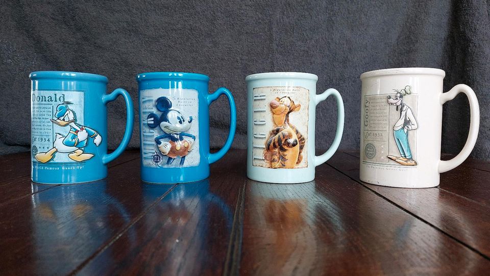 7 Disney Sammler Tassen zu verkaufen in Wedel